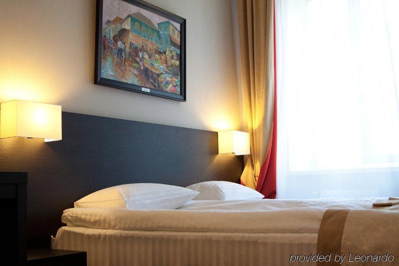 Optima Collection Kharkiv Hotel Pokoj fotografie