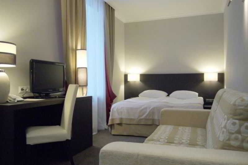 Optima Collection Kharkiv Hotel Pokoj fotografie